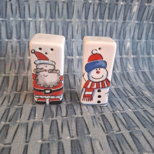 Salt and pepper set with Christmas snowman and Santa theme like new