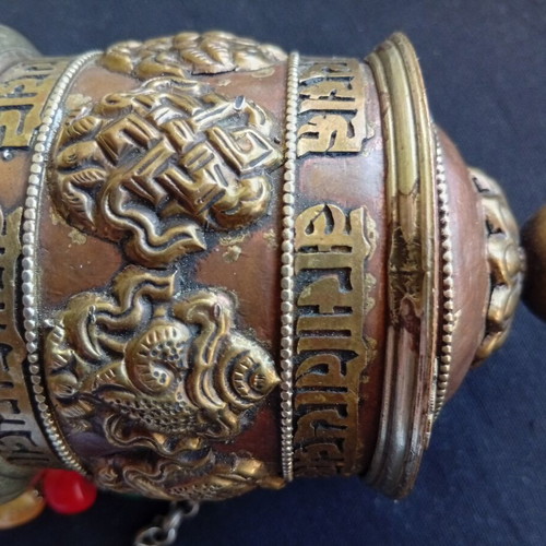 Tibetan prayer wheel used with original thin old paper