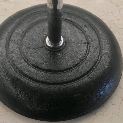 Professional microphone stand used with heavy steel base