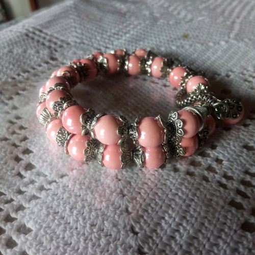 Handmade pink bracelet with beads and silver tones new