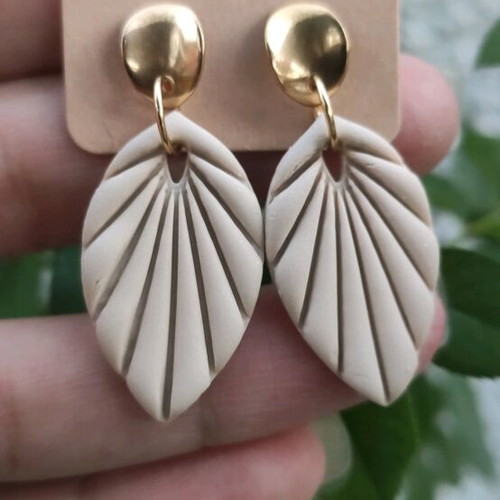 Earrings made of polymer clay and steel beige gold color