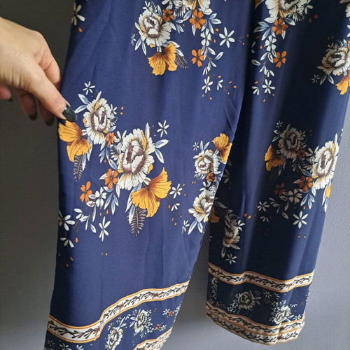 Sleeveless V-Neck Wide Leg Jumpsuit new, navy blue with floral patterns