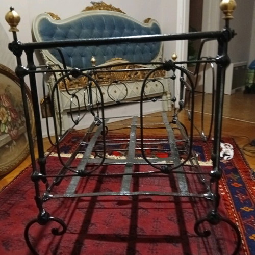 Baby cradle old handmade iron with bronze details refurbished