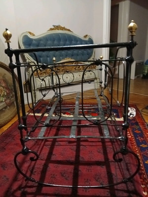 Baby cradle old handmade iron with bronze details refurbished