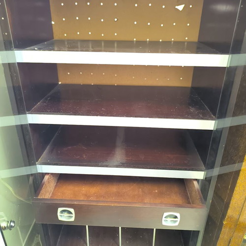 Vintage wooden cabinet with silver details, shelves and glass doors