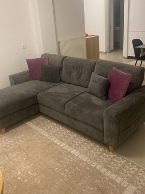 Corner gray sofa bed three-seater almost new