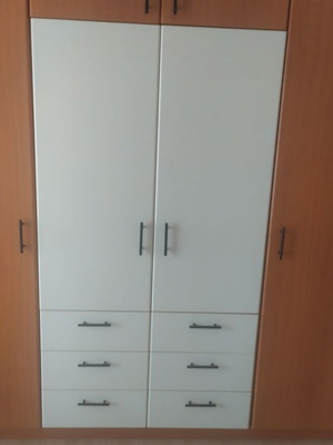 Custom four-door bakelite wardrobe with loft