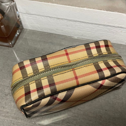Burberry luxury toiletry bag used with defects
