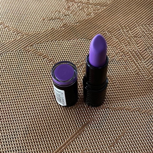 Makeup Revolution Scandalous Lipstick used once, purple shade, moisturizing