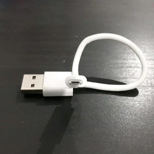 USB charger cable used, white color
