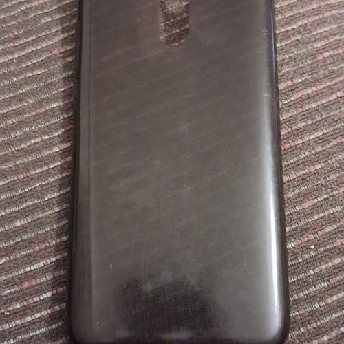 Xiaomi 9 smartphone with screen protector and case, gray