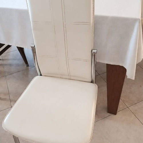 Set of 4 beige dining chairs with leatherette upholstery