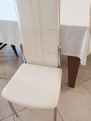 Set of 4 beige dining chairs with leatherette upholstery