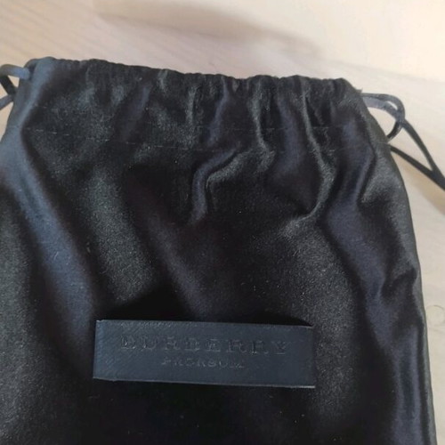 Burberry bracelet for hand like new, brown and yellow