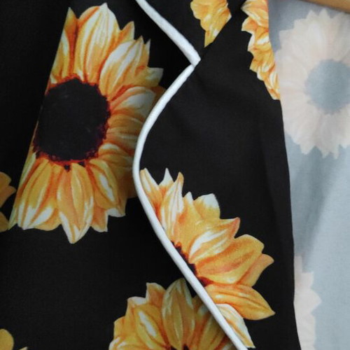 Pajama set with sunflowers like new, size XXL, black and yellow