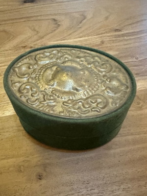 Vintage box used with embossed lid and felt-like texture
