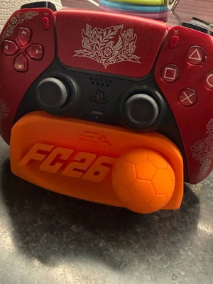 FIFA 26 stand for PS5, orange