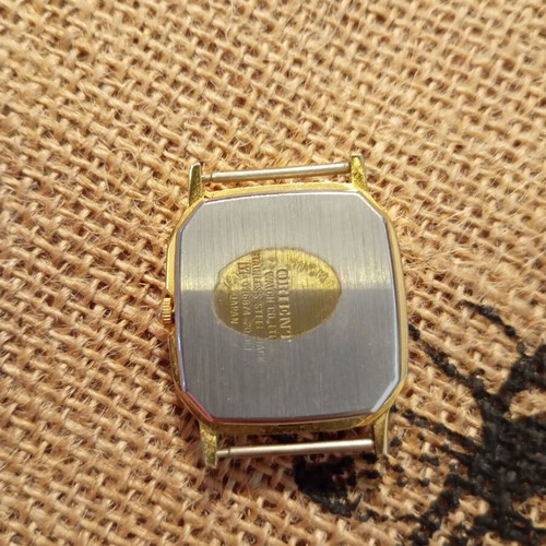 Orient watch octagonal used, no strap, black and yellow