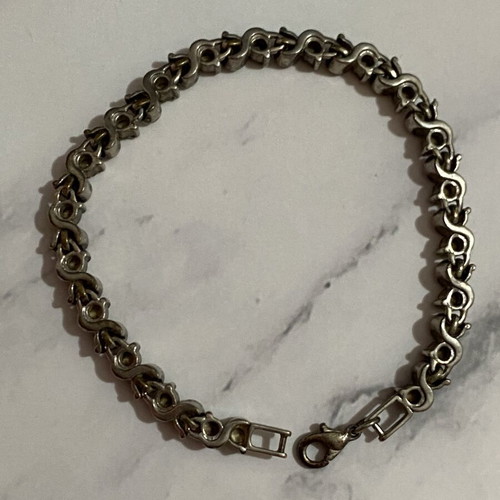 Bracelet with rhinestones used, silver color