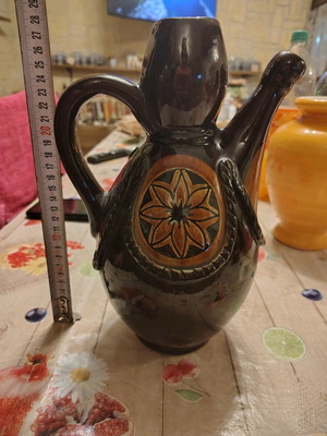 Vintage ceramic jug with figures restored