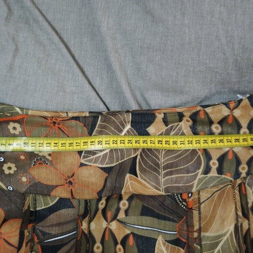 Elegant Vagias Collection suit like new with floral details