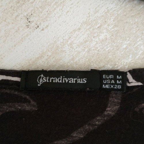 Stradivarius black sleeveless top with face pattern like new, Medium