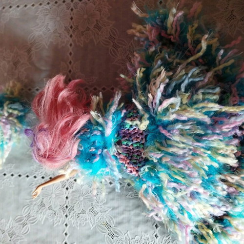 Doll with handmade dress and hat used