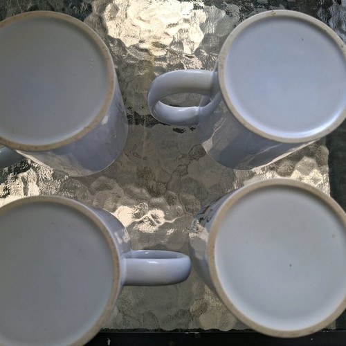 Ceramic mugs like new, pack of 4 with various designs