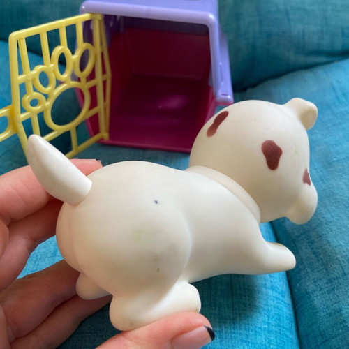 Simba collectible dog figure with carrying cage used