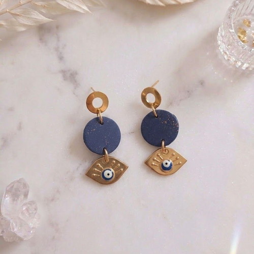 Polymer clay earrings with gold leaf and evil eye