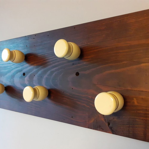 Wooden wall hanger with handles from old barber shaving brushes