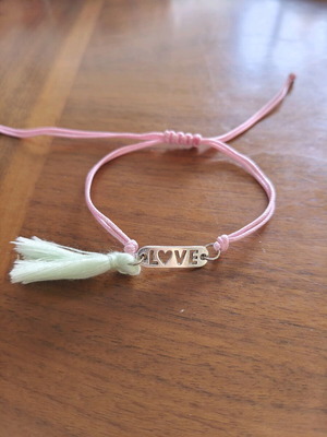 Love bracelet with pink macrame cord and tassel, adjustable, new