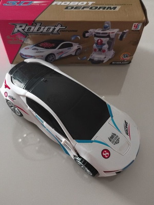 Robot car used with sounds and lights, transforms from car to robot