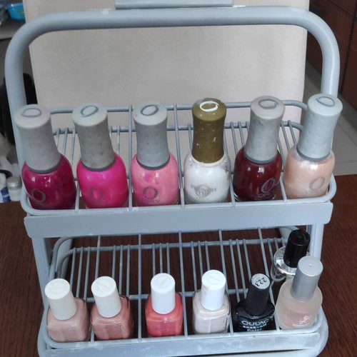 Orly metal tabletop stand with 36 slots for nail polishes used
