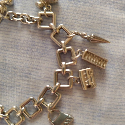 Burberry charm watch bracelet like new, silver plated finish