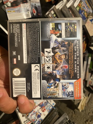 X Men Official Game Nintendo DS like new, CIB
