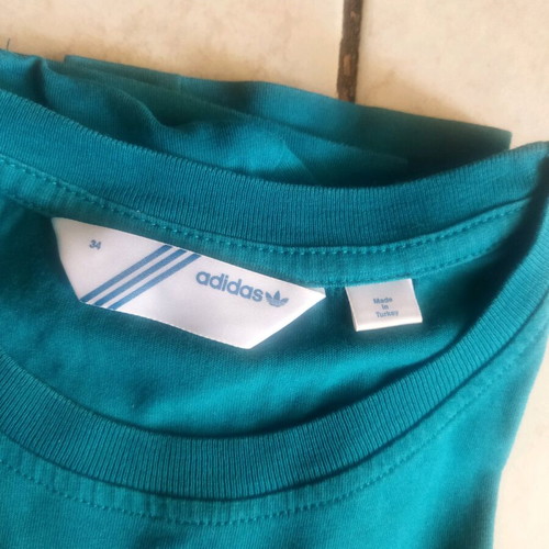 Set of two Puma and Adidas shirts like new