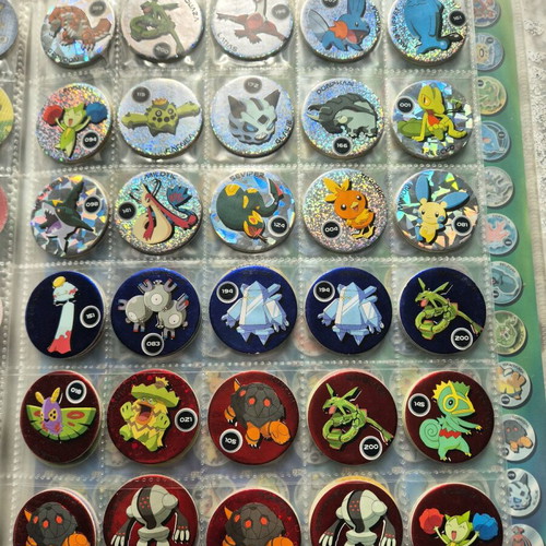 Pokemon collectible caps 213 pieces like new