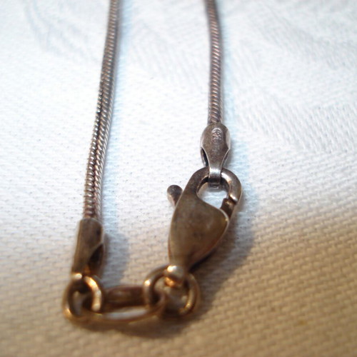 Necklace with black pearl and 925 silver chain like new