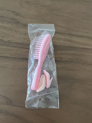 Vintage Barbie accessories set with brush and pink shoes