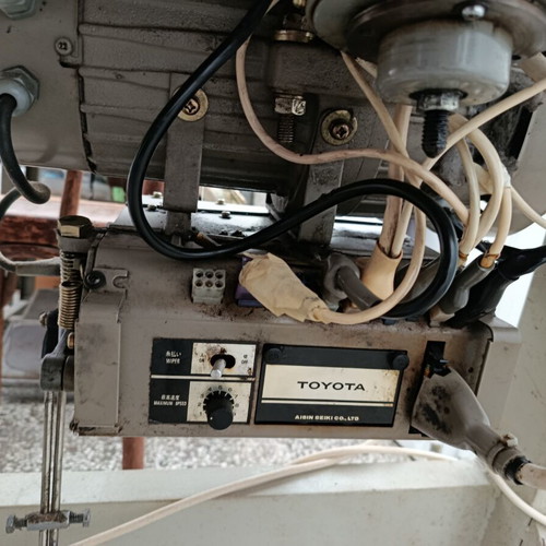 Toyota AD1013-F8 Aisin Seiki industrial sewing machine with electronic control panel
