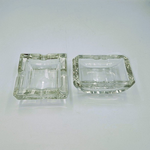 Set of 2 used crystal ashtrays in square and rectangular shapes
