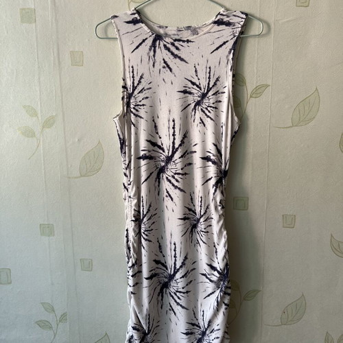 White elastic dress with unique design and side ties, like new, sizes S/M