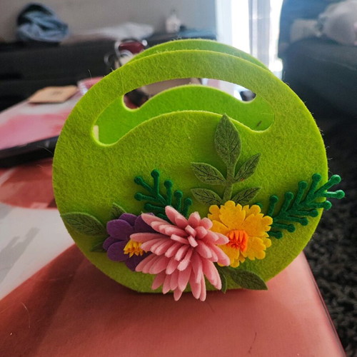 Felt basket like new with stamps on the inner side