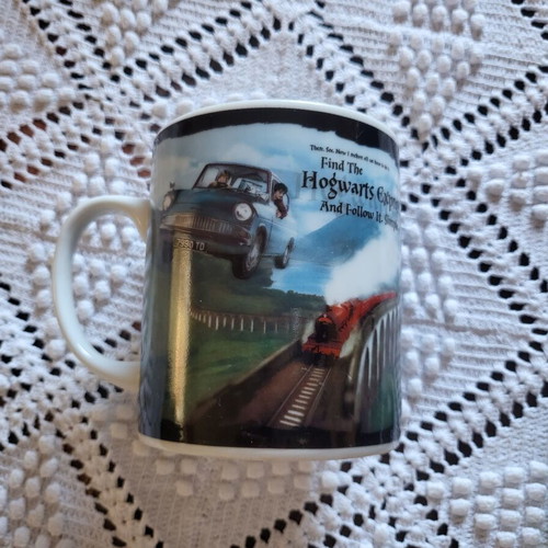 Harry Potter mug and phone case used, Hogwarts Express and Slytherin iPhone