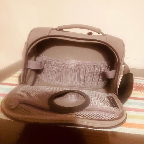 Delsey toiletry bag like new, gray with 2 compartments and shoulder strap