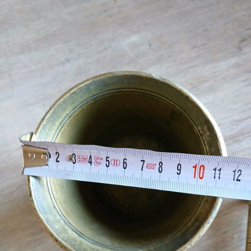 Antique brass mortar used with subtle design
