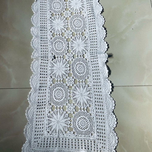 Handmade crocheted table runner used with cotton thread