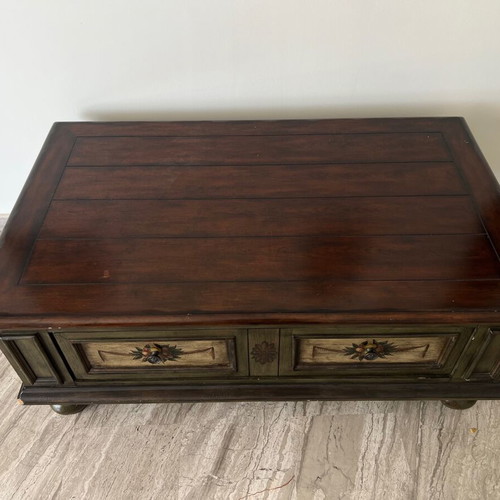 Coffee table used with storage space
