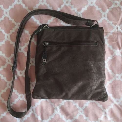 Brown suede crossbody bag used with multiple pockets